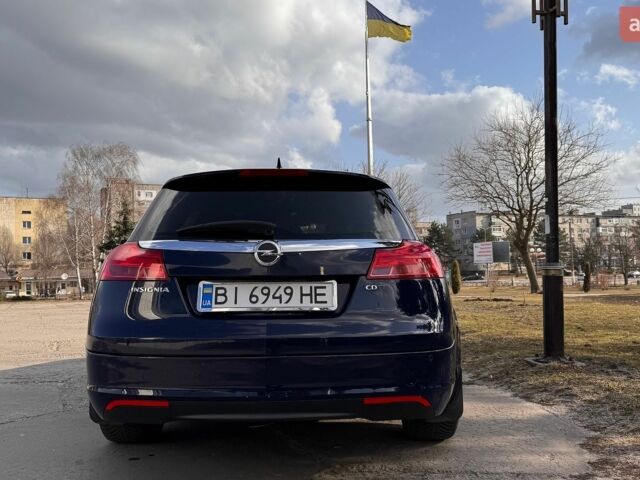 Синий Опель Инсигния, объемом двигателя 1.96 л и пробегом 250 тыс. км за 9000 $, фото 2 на Automoto.ua