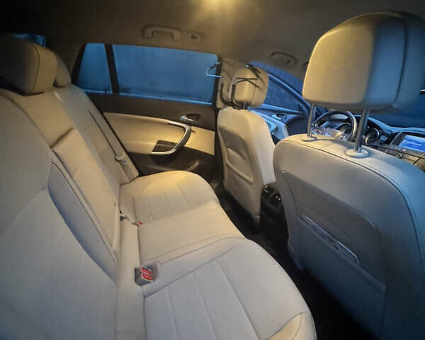 Синий Опель Инсигния, объемом двигателя 1.96 л и пробегом 251 тыс. км за 8200 $, фото 9 на Automoto.ua