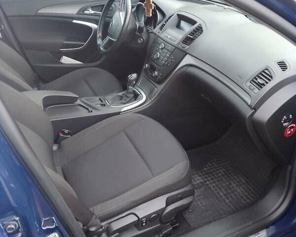 Синий Опель Инсигния, объемом двигателя 2 л и пробегом 249 тыс. км за 8600 $, фото 6 на Automoto.ua