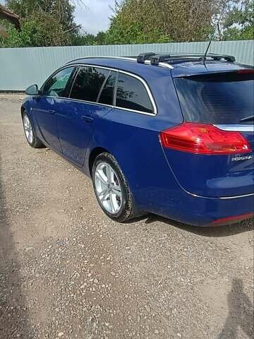 Синий Опель Инсигния, объемом двигателя 2 л и пробегом 220 тыс. км за 8000 $, фото 4 на Automoto.ua