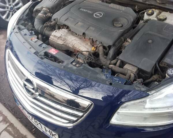 Синий Опель Инсигния, объемом двигателя 2 л и пробегом 249 тыс. км за 8600 $, фото 3 на Automoto.ua