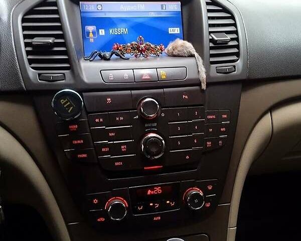 Синий Опель Инсигния, объемом двигателя 2 л и пробегом 360 тыс. км за 8700 $, фото 3 на Automoto.ua