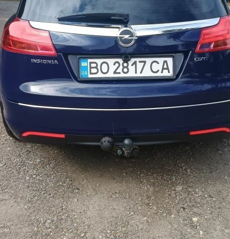 Синий Опель Инсигния, объемом двигателя 2 л и пробегом 220 тыс. км за 8300 $, фото 3 на Automoto.ua