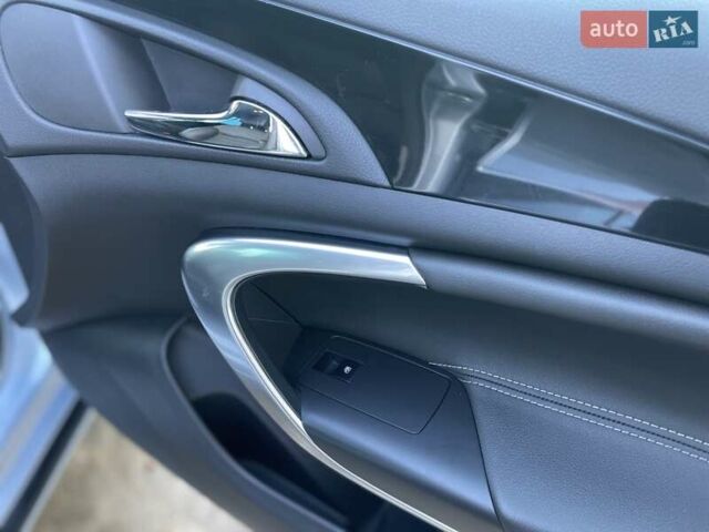 Синій Опель Інсігнія, об'ємом двигуна 1.96 л та пробігом 267 тис. км за 9000 $, фото 61 на Automoto.ua