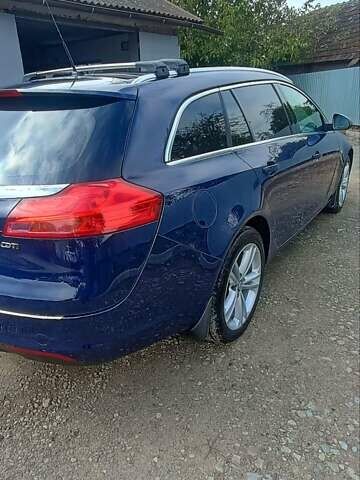 Синий Опель Инсигния, объемом двигателя 2 л и пробегом 220 тыс. км за 8000 $, фото 1 на Automoto.ua