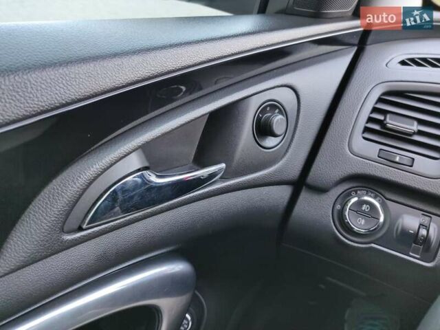 Синій Опель Інсігнія, об'ємом двигуна 1.96 л та пробігом 200 тис. км за 9779 $, фото 23 на Automoto.ua