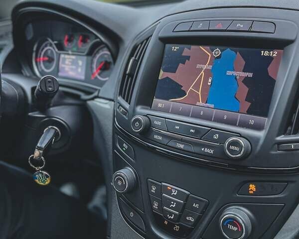 Синій Опель Інсігнія, об'ємом двигуна 1.96 л та пробігом 270 тис. км за 9500 $, фото 27 на Automoto.ua