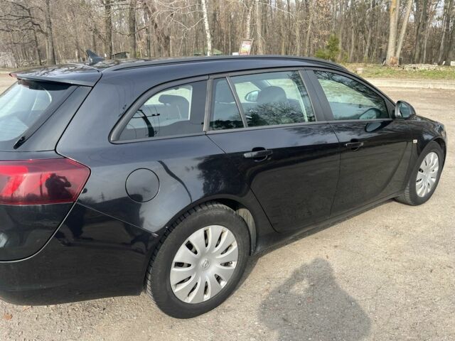 Синий Опель Инсигния, объемом двигателя 2 л и пробегом 320 тыс. км за 8700 $, фото 6 на Automoto.ua