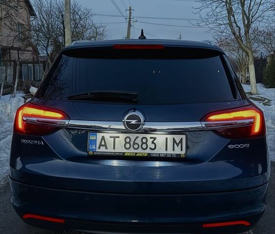 Синій Опель Інсігнія, об'ємом двигуна 2 л та пробігом 261 тис. км за 14300 $, фото 1 на Automoto.ua