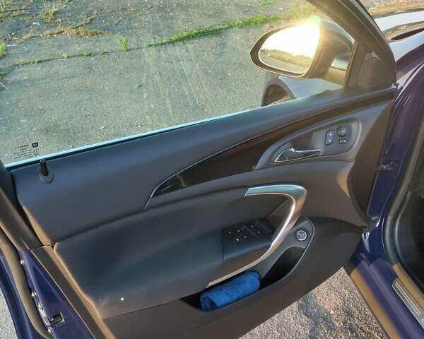 Синий Опель Инсигния, объемом двигателя 2 л и пробегом 216 тыс. км за 9500 $, фото 6 на Automoto.ua