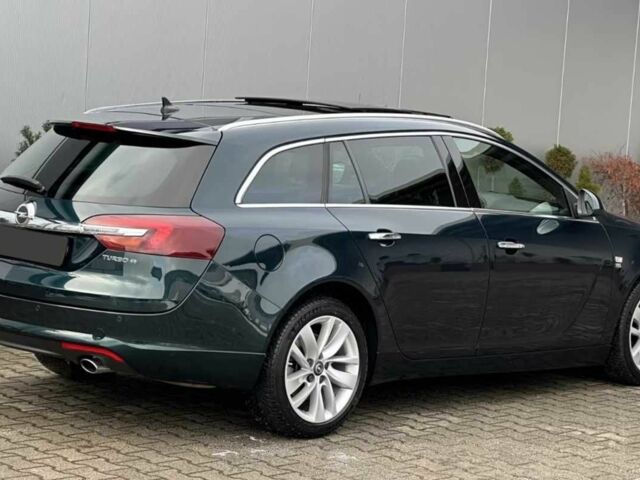 Синій Опель Інсігнія, об'ємом двигуна 2 л та пробігом 70 тис. км за 14000 $, фото 2 на Automoto.ua