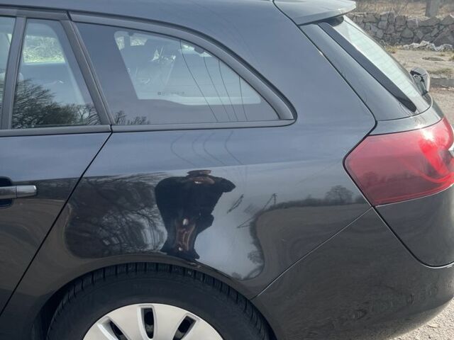 Синий Опель Инсигния, объемом двигателя 2 л и пробегом 320 тыс. км за 8700 $, фото 3 на Automoto.ua