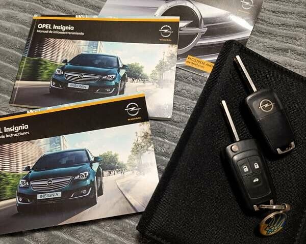 Синій Опель Інсігнія, об'ємом двигуна 1.96 л та пробігом 270 тис. км за 9500 $, фото 29 на Automoto.ua