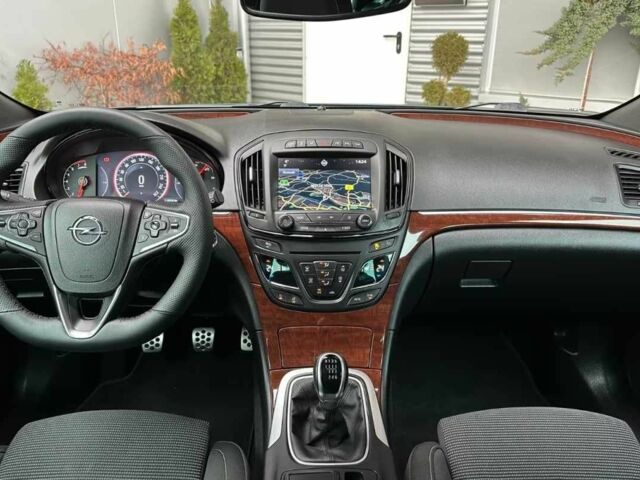 Синій Опель Інсігнія, об'ємом двигуна 2 л та пробігом 70 тис. км за 14000 $, фото 5 на Automoto.ua