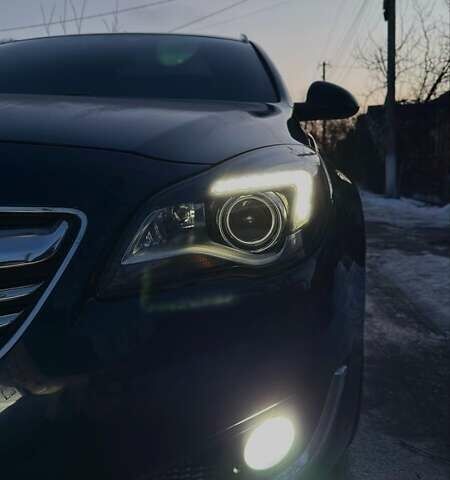 Синій Опель Інсігнія, об'ємом двигуна 2 л та пробігом 261 тис. км за 14300 $, фото 2 на Automoto.ua