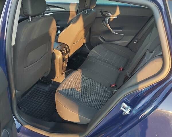 Синий Опель Инсигния, объемом двигателя 2 л и пробегом 216 тыс. км за 9500 $, фото 4 на Automoto.ua