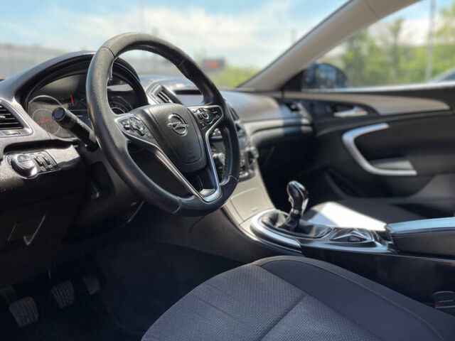 Синий Опель Инсигния, объемом двигателя 2 л и пробегом 316 тыс. км за 9600 $, фото 7 на Automoto.ua