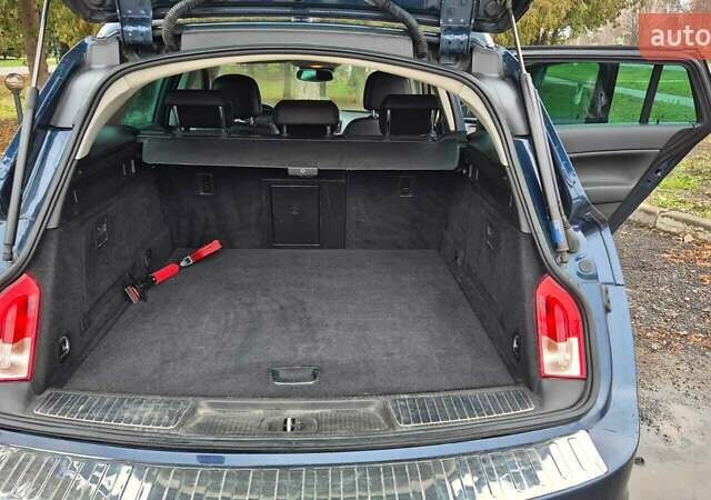 Синий Опель Инсигния, объемом двигателя 1.96 л и пробегом 226 тыс. км за 9300 $, фото 5 на Automoto.ua