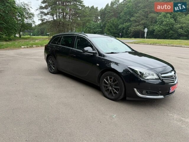Синий Опель Инсигния, объемом двигателя 2 л и пробегом 260 тыс. км за 9800 $, фото 2 на Automoto.ua