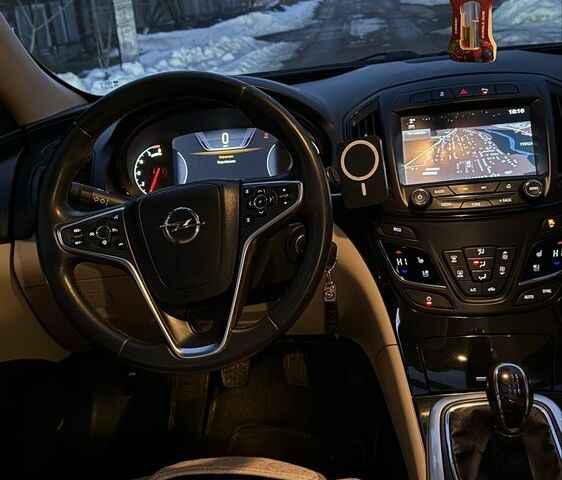 Синій Опель Інсігнія, об'ємом двигуна 2 л та пробігом 261 тис. км за 14300 $, фото 6 на Automoto.ua