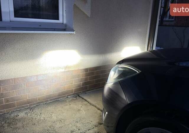 Синій Опель Інсігнія, об'ємом двигуна 2 л та пробігом 261 тис. км за 14300 $, фото 7 на Automoto.ua