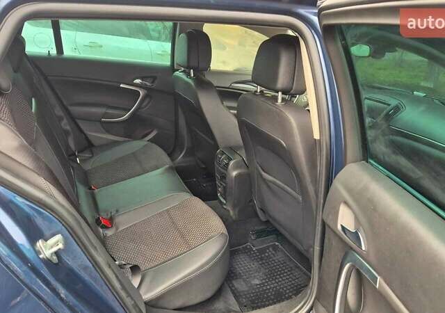 Синий Опель Инсигния, объемом двигателя 1.96 л и пробегом 226 тыс. км за 9300 $, фото 6 на Automoto.ua