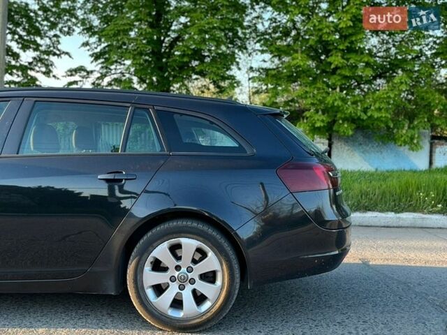 Синий Опель Инсигния, объемом двигателя 1.96 л и пробегом 319 тыс. км за 8000 $, фото 6 на Automoto.ua