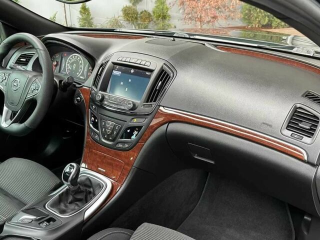 Синій Опель Інсігнія, об'ємом двигуна 2 л та пробігом 70 тис. км за 14000 $, фото 7 на Automoto.ua