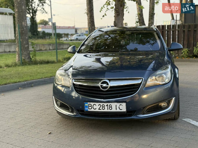 Синий Опель Инсигния, объемом двигателя 1.96 л и пробегом 312 тыс. км за 9799 $, фото 4 на Automoto.ua