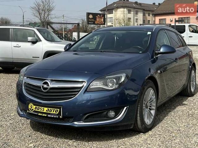 Синій Опель Інсігнія, об'ємом двигуна 2 л та пробігом 250 тис. км за 10300 $, фото 2 на Automoto.ua