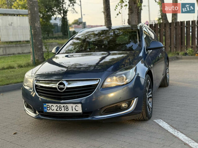 Синий Опель Инсигния, объемом двигателя 1.96 л и пробегом 312 тыс. км за 9799 $, фото 5 на Automoto.ua