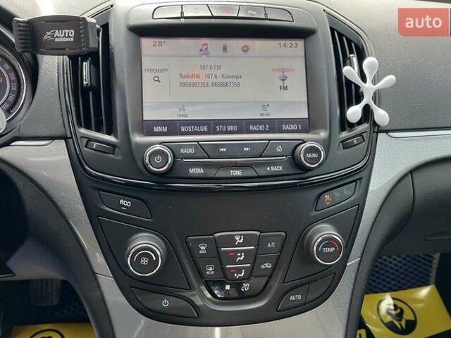 Синій Опель Інсігнія, об'ємом двигуна 2 л та пробігом 250 тис. км за 10300 $, фото 11 на Automoto.ua