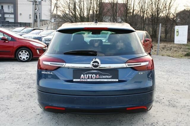Синий Опель Инсигния, объемом двигателя 2 л и пробегом 174 тыс. км за 12450 $, фото 3 на Automoto.ua