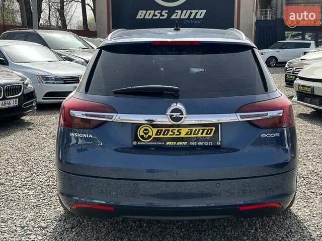 Синій Опель Інсігнія, об'ємом двигуна 2 л та пробігом 250 тис. км за 10300 $, фото 4 на Automoto.ua