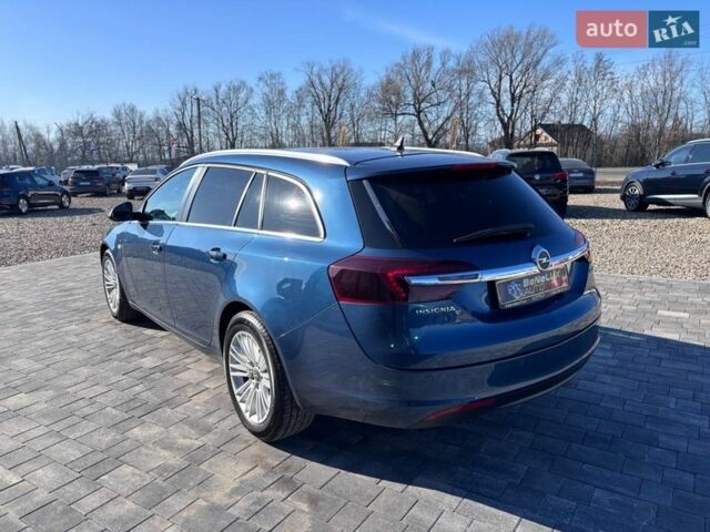 Синій Опель Інсігнія, об'ємом двигуна 1.96 л та пробігом 253 тис. км за 8999 $, фото 6 на Automoto.ua