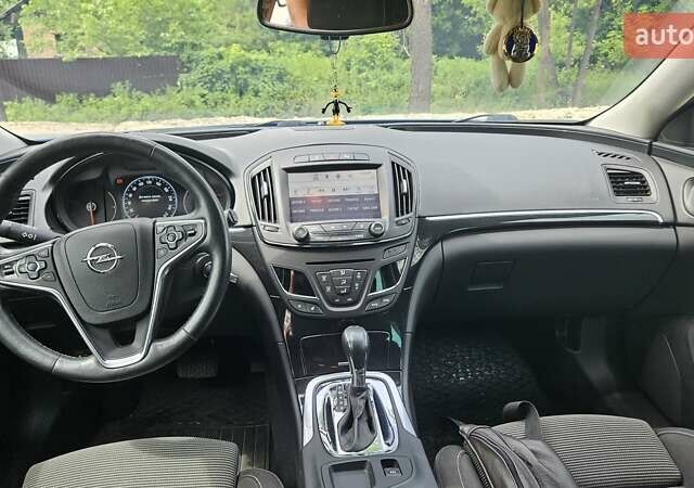 Синий Опель Инсигния, объемом двигателя 1.96 л и пробегом 95 тыс. км за 14000 $, фото 26 на Automoto.ua