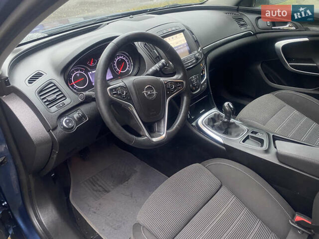 Синий Опель Инсигния, объемом двигателя 1.6 л и пробегом 210 тыс. км за 11500 $, фото 4 на Automoto.ua