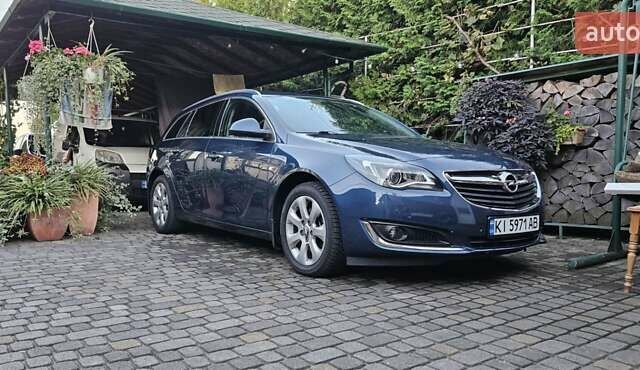 Синий Опель Инсигния, объемом двигателя 1.96 л и пробегом 95 тыс. км за 14000 $, фото 2 на Automoto.ua