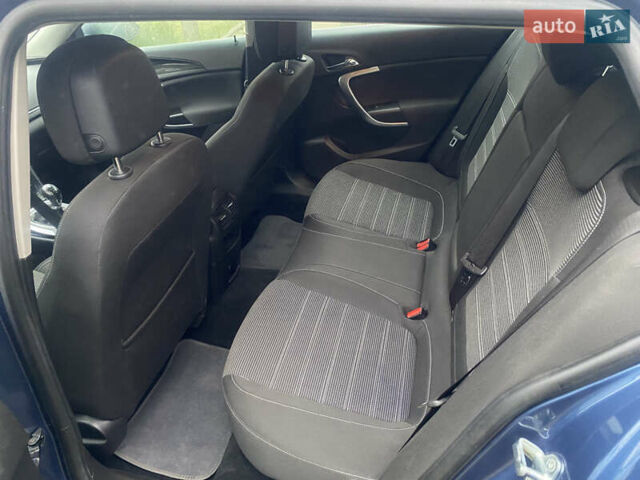 Синий Опель Инсигния, объемом двигателя 1.6 л и пробегом 210 тыс. км за 11500 $, фото 7 на Automoto.ua