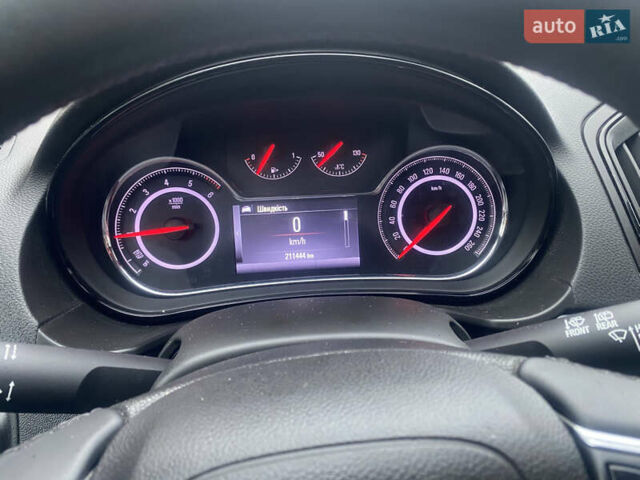 Синий Опель Инсигния, объемом двигателя 1.6 л и пробегом 210 тыс. км за 11500 $, фото 5 на Automoto.ua