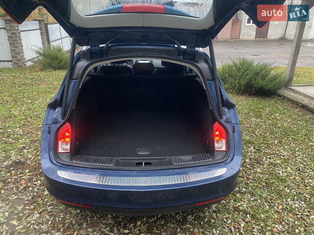 Синій Опель Інсігнія, об'ємом двигуна 1.6 л та пробігом 210 тис. км за 10500 $, фото 6 на Automoto.ua