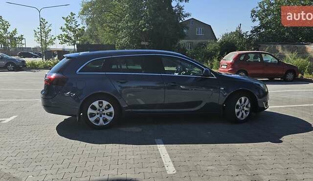 Синий Опель Инсигния, объемом двигателя 1.96 л и пробегом 95 тыс. км за 14000 $, фото 13 на Automoto.ua