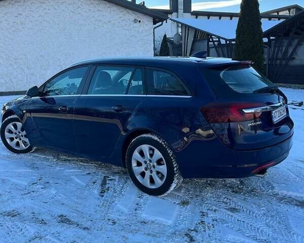 Синій Опель Інсігнія, об'ємом двигуна 2 л та пробігом 245 тис. км за 11500 $, фото 4 на Automoto.ua