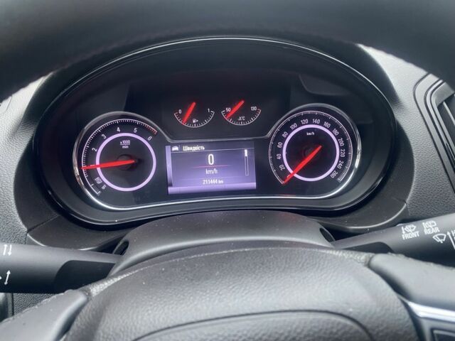 Синий Опель Инсигния, объемом двигателя 1.6 л и пробегом 210 тыс. км за 11500 $, фото 4 на Automoto.ua