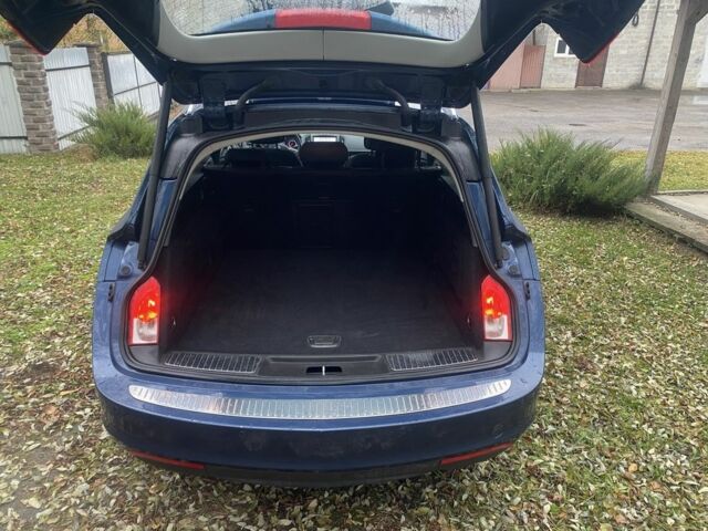 Синий Опель Инсигния, объемом двигателя 1.6 л и пробегом 210 тыс. км за 11500 $, фото 6 на Automoto.ua