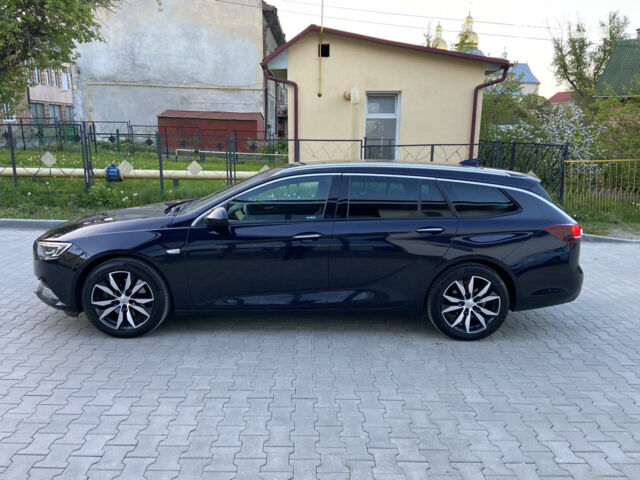 Синій Опель Інсігнія, об'ємом двигуна 1.96 л та пробігом 165 тис. км за 17150 $, фото 2 на Automoto.ua