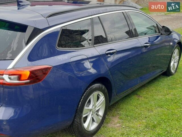 Синій Опель Інсігнія, об'ємом двигуна 1.96 л та пробігом 230 тис. км за 13300 $, фото 77 на Automoto.ua