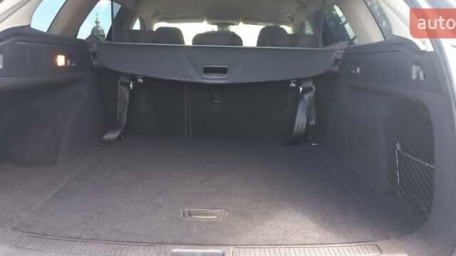 Синий Опель Инсигния, объемом двигателя 1.6 л и пробегом 190 тыс. км за 13500 $, фото 4 на Automoto.ua