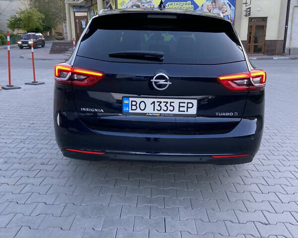 Синій Опель Інсігнія, об'ємом двигуна 1.96 л та пробігом 165 тис. км за 17650 $, фото 70 на Automoto.ua