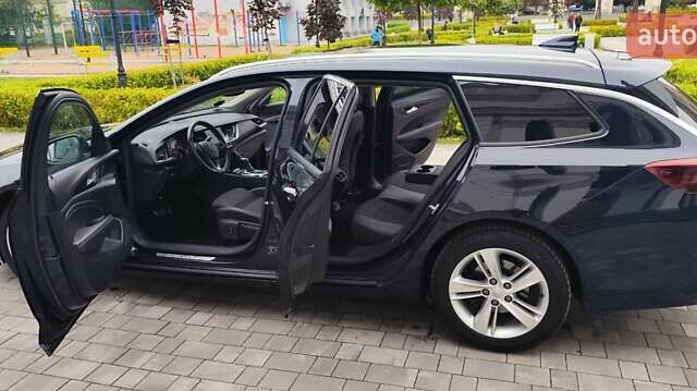 Синий Опель Инсигния, объемом двигателя 1.6 л и пробегом 285 тыс. км за 12899 $, фото 18 на Automoto.ua